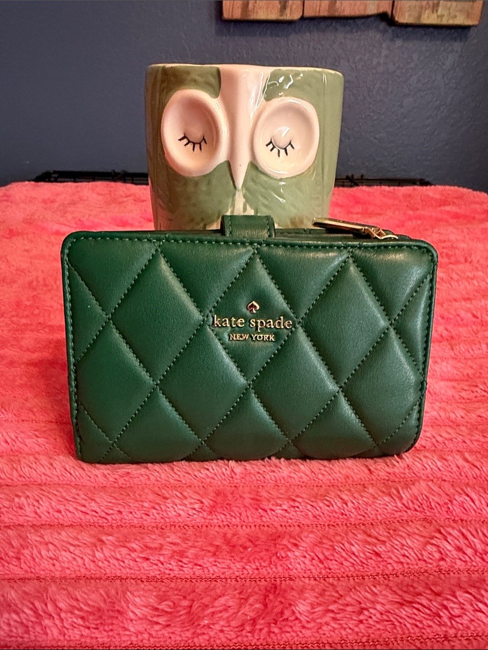 kate spade emerald green quilted leather zip wallet with gold logo